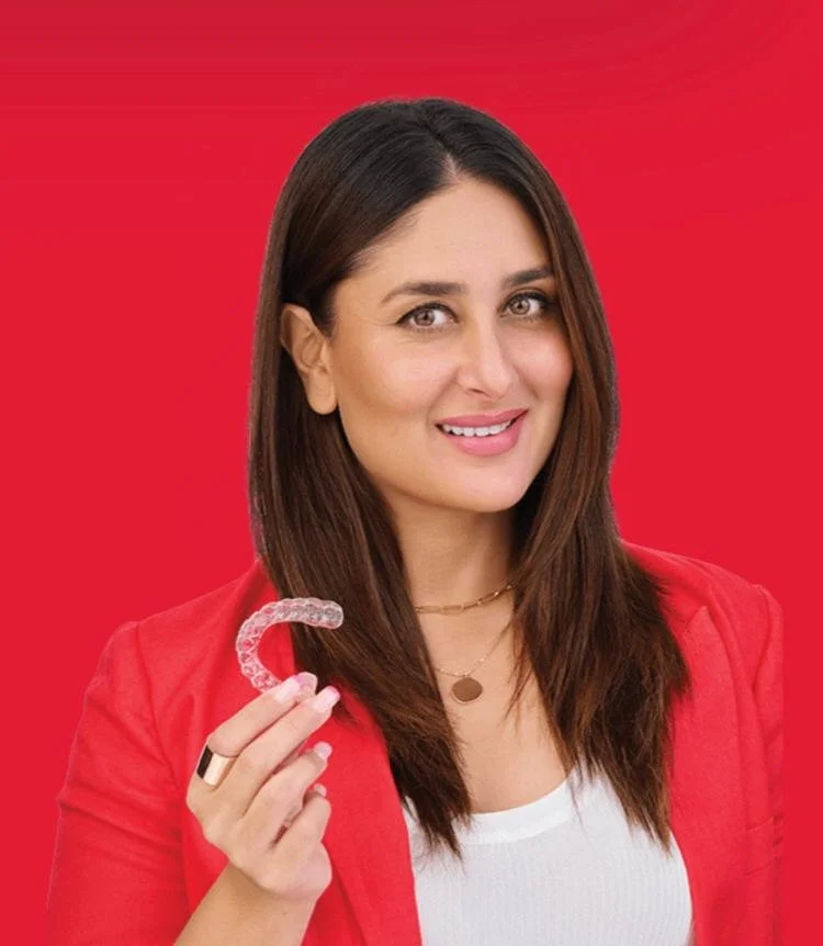 Karina Kapoor holding aligners from Illusion aligners